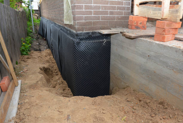 Happy homeowners after waterproofing job in Folsom